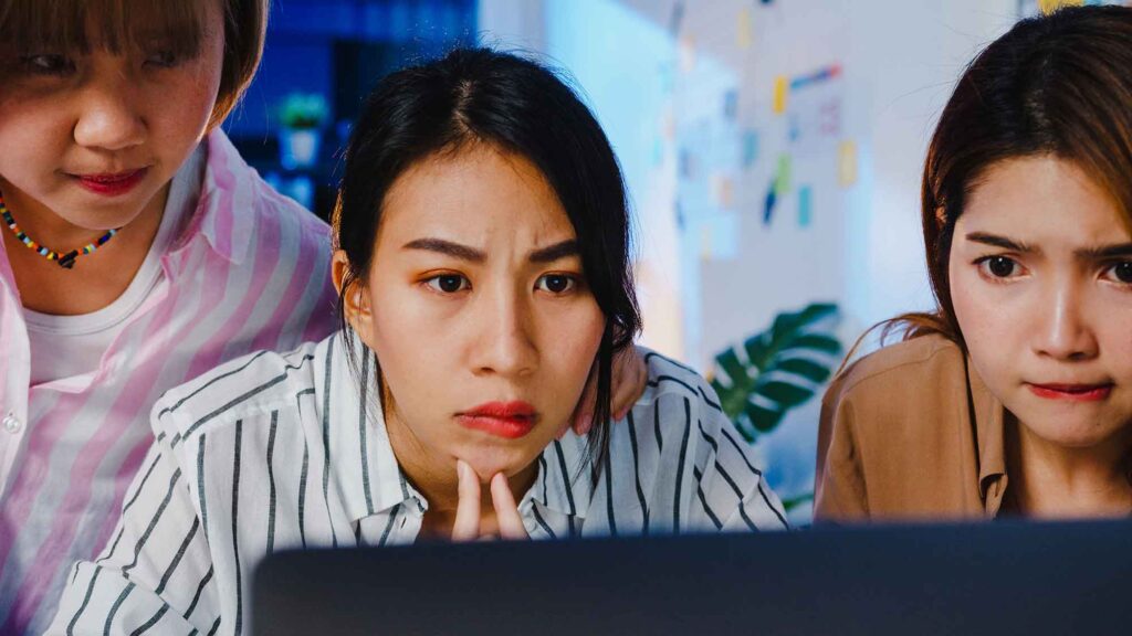 Group of Asia businesspeople using computer laptop presentation | AD-IOS Web Development Digital Marketing Lies